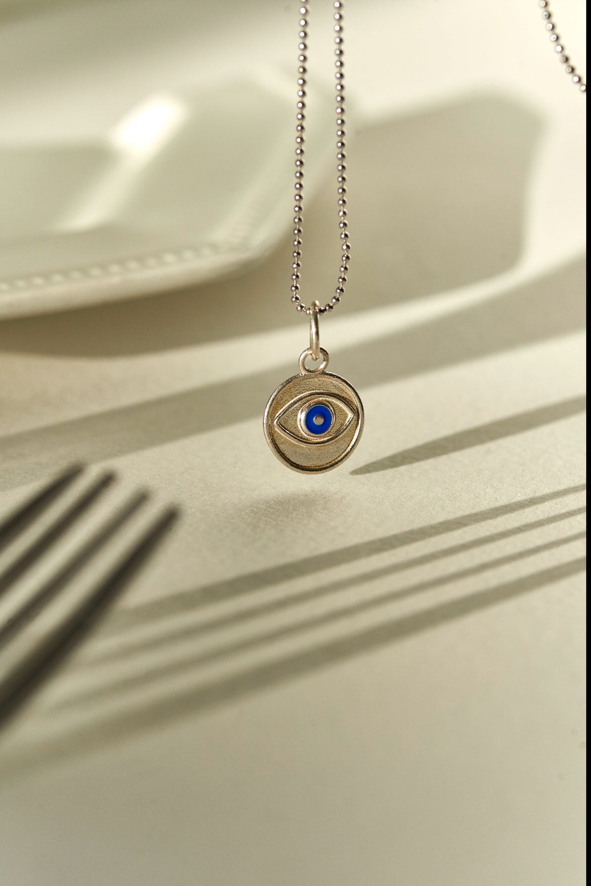 Evil Eye Coin Pendant